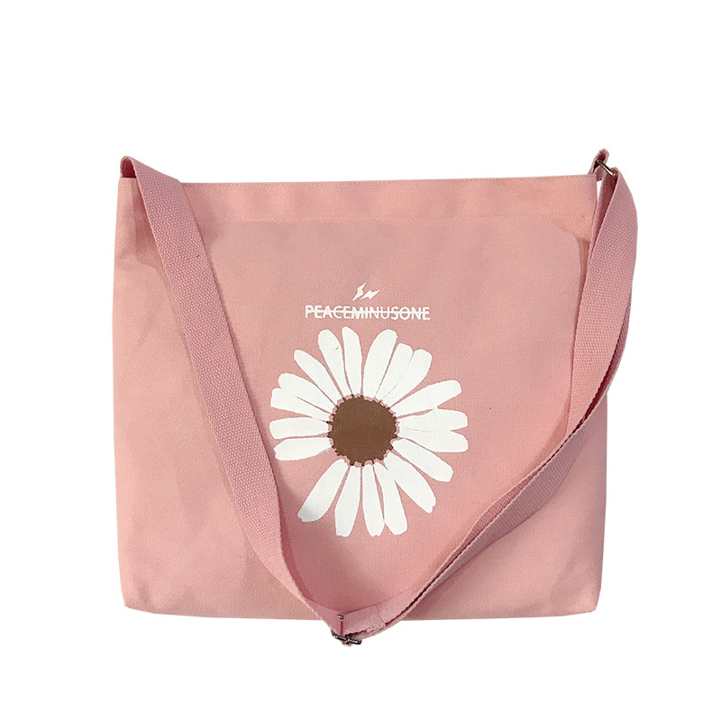 Factory direct sales of printed fashionable hand-held shoulder bags, large capacity versatile canvas bags, small Daisy simple shopping bags for women Item Picture