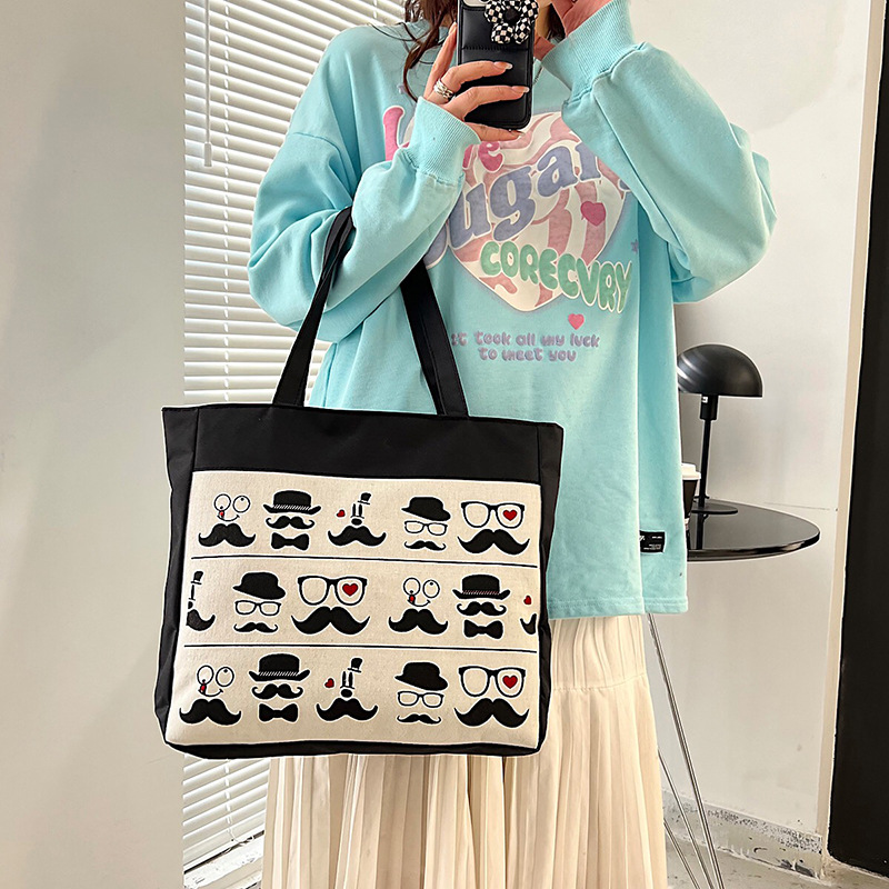 Wholesale of new large-capacity women's single-shoulder bags with logo printing, fashionable canvas bags, hand-held tote bags and women's shopping bags Application Scenario