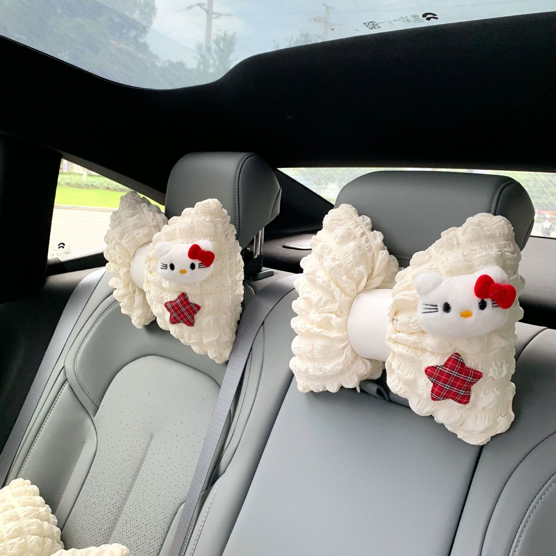 Cute puff cat car headrest, popular female car waist cushion, car decoration, in-car neck support seat pillow Application Scenario