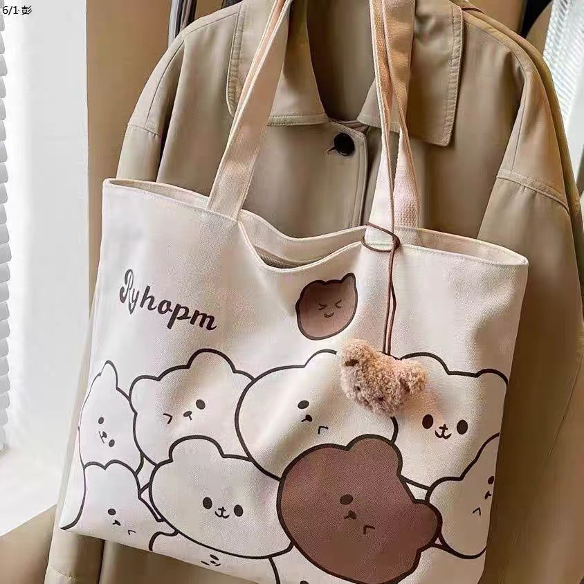 A new large-capacity casual bag for women, a cartoon bear canvas bag, and a single-shoulder tote bag for college students' commuting to class Specification drawing