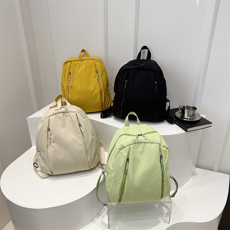 Wholesale retro and simple backpacks, new college-style student school bags, lightweight and versatile, campus travel backpacks full figure