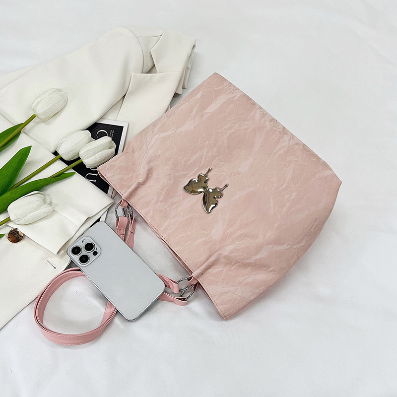 A new large-capacity fashionable ins single-shoulder bag with a gentle texture in the Korean style, a tote bag with a bow, a versatile handbag for women Application Scenario