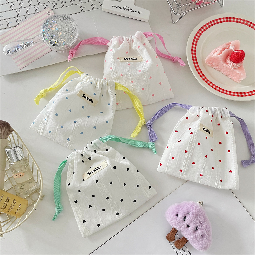 56291 InS-style cute printed heart-shaped storage bag, student sanitary napkin tidying bag, miscellaneous storage cloth bag details Picture