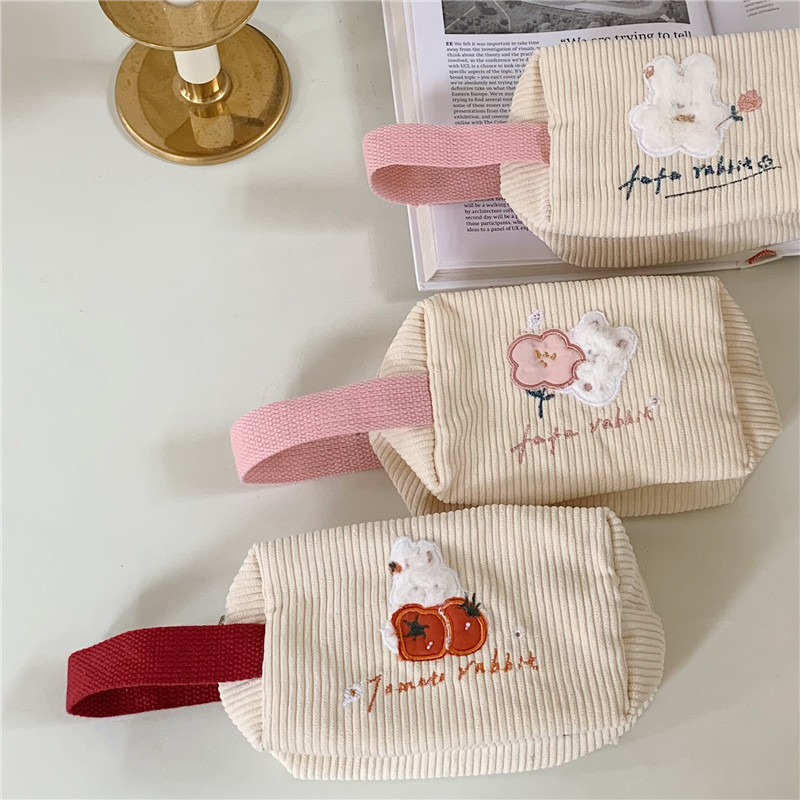 2264 Cute embroidered flower rabbit hand-held makeup bag, storage bag, portable travel toiletry bag, student ins pen case Application Scenario