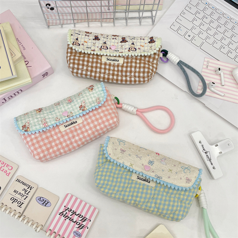 5412 Cute Cartoon patchwork printed pen Case, large-capacity portable makeup bag for women, student stationery box pen case Application Scenario