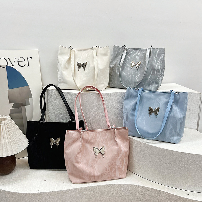 A new large-capacity fashionable ins single-shoulder bag with a gentle texture in the Korean style, a tote bag with a bow, a versatile handbag for women full figure