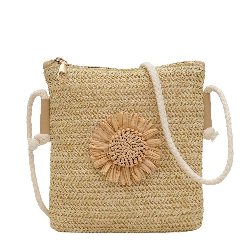 A new casual and simple woven bag, a mini phone bag made of flower grass, is a versatile student handbag that is selling well among women Item Picture