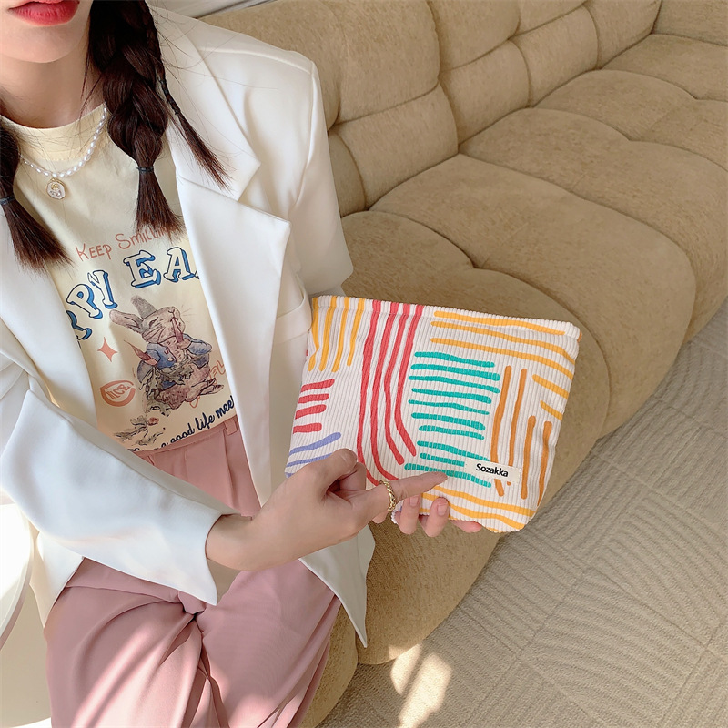 35201 ins canvas color-blocking striped cosmetic bag, large-capacity crossbody single-shoulder bag, work commuting handbag Application Scenario