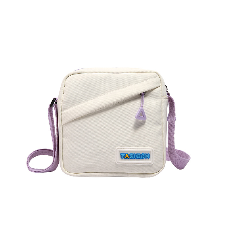 A cute and niche Japanese-style small canvas bag for women, a 2024 new versatile mobile phone crossbody bag, a trendy single-shoulder bag for young women Item Picture