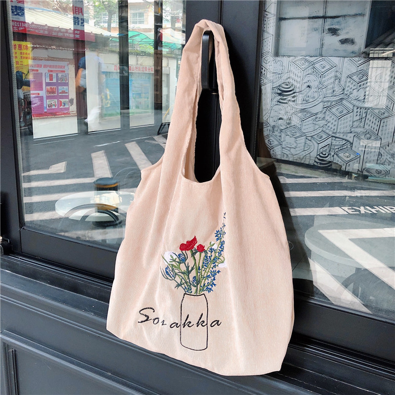 C58 Japanese chic super Fairy bag, ins corduroy embroidery forest girl style artistic hand-held cloth bag search source Item Picture