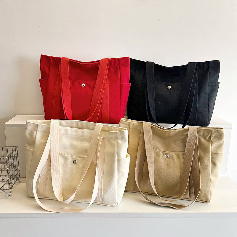 Wholesale of new women's single-shoulder bags, cross-border simple and casual canvas bags, Korean version LOGO printed commuter tote bags Specification drawing