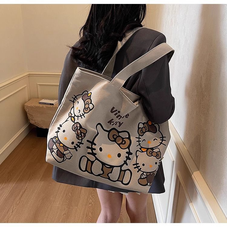 Cartoon canvas single-shoulder bag, women's large-capacity commuter tote bag, Spring/Summer 2025, cute cat tote bag, cross-border Application Scenario