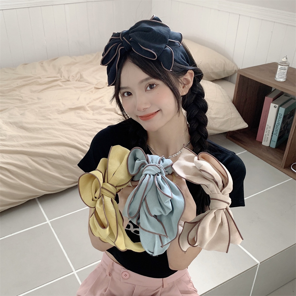 26123 Early Spring new ins three-dimensional printed plain color bow hairpin for facial slimming and facial enhancement full figure