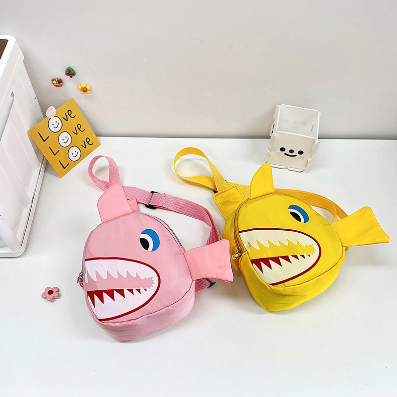 This trendy children's bag is a unique little shark chest bag for boys. It's a stylish crossbody bag for babies going on trips details Picture