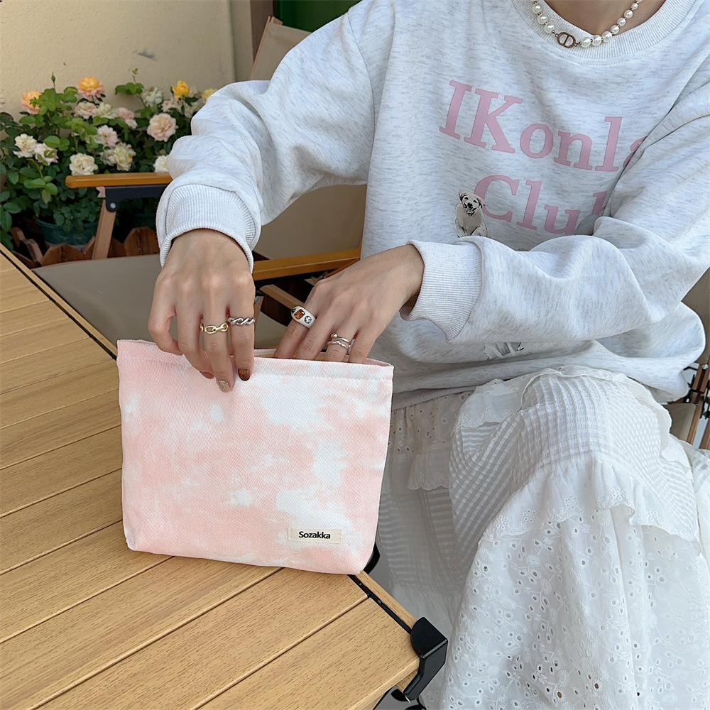 310174 Tie-dyed toiletry bag, women's fabric storage bag, small bag, clutch bag, storage bag, portable casual makeup bag Application Scenario