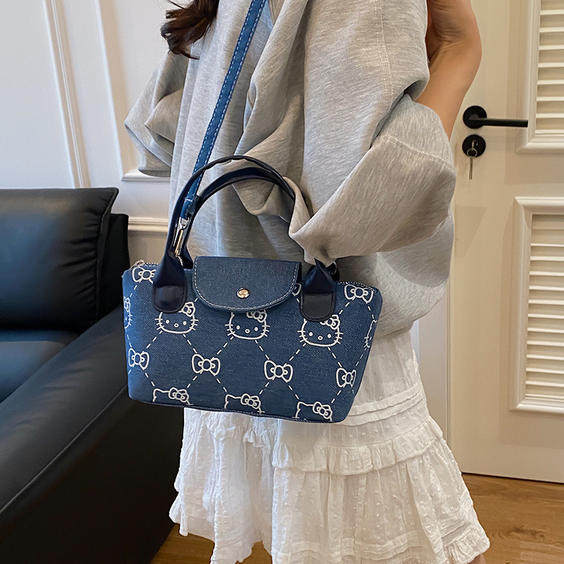 Fashionable single-shoulder crossbody bag 2025 new mini dumpling bag, cute and stylish denim printed kitten handbag for women Application Scenario