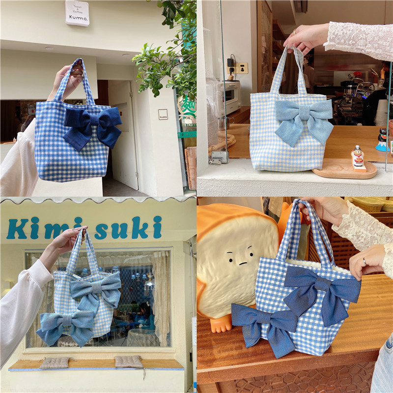 13141 New fresh checkered bow hand-held bento bag, cute girl Japanese-style student handbag wholesale full figure