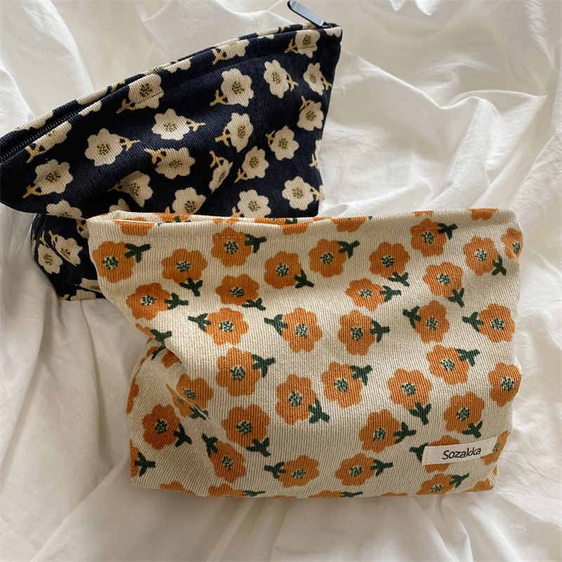 110223 Corduroy plum blossom cosmetic bag, carry it with you, hold the coin purse, women's ins Japanese-style artistic storage bag details Picture