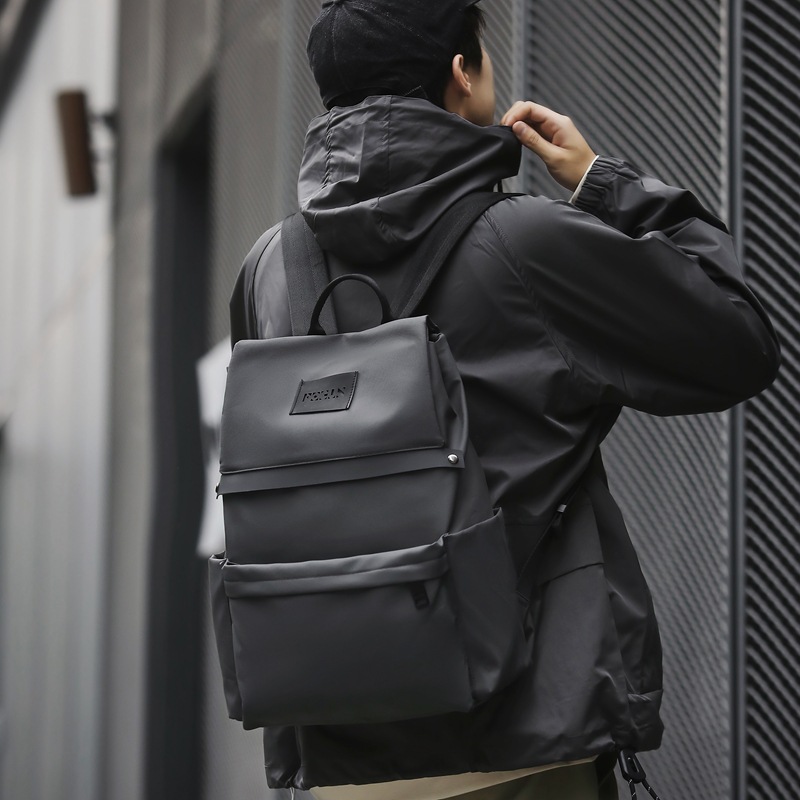WEPOWER's new trendy backpack is a large-capacity backpack for both male and female students, a simple and casual hand-held backpack for commuting full figure