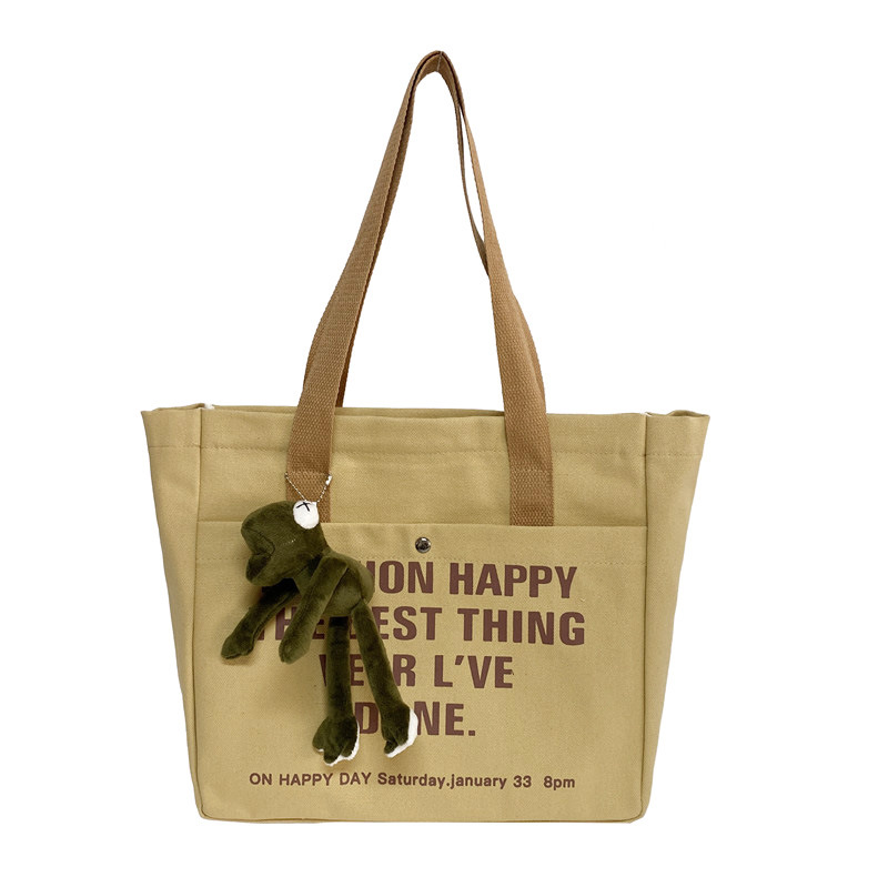 Large-capacity canvas bag for women, 2022 new style casual and laid-back school-style crossbody bag, hand-held tote bag, student schoolbag Item Picture