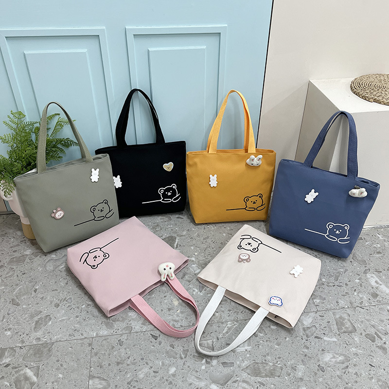 2022 New Japanese-style ins fresh and clean shopping storage bags, lunch boxes, bento bags, girls' handbags, canvas bags full figure