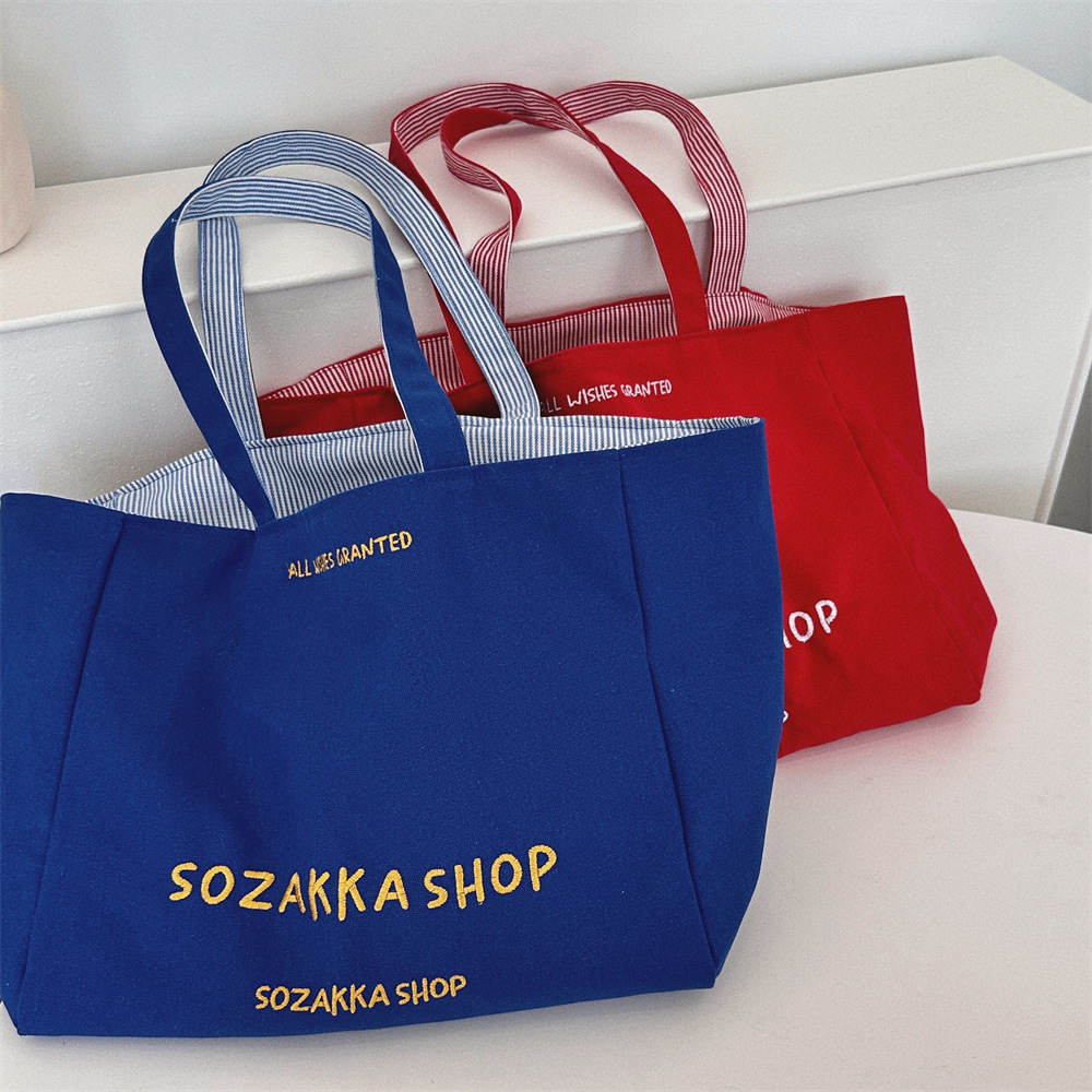 49191 New letter-embroidered canvas bag, artistic and casual, large-capacity single-shoulder bag, women's reversible tote bag Application Scenario