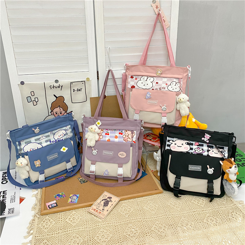 Crossbody bag, school work bag, female Instagram Japanese-style postman bag, large-capacity versatile canvas single-shoulder bag, student hand-carry full figure