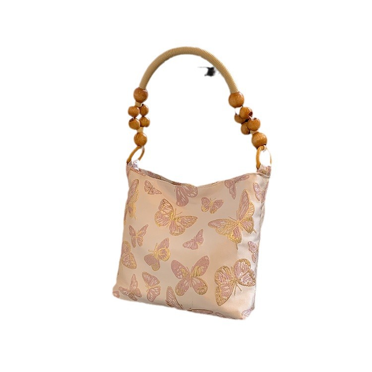 The versatile and high-end single-shoulder bag of 2024, the new Chinese-style tote hand-held bamboo joint bag, and the niche underarm bag are selling well among women Item Picture