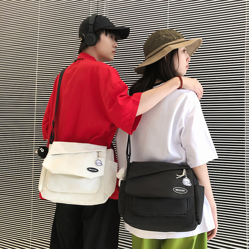 Ins-style Korean style versatile large-capacity crossbody bag, Japanese female college student class bag that can carry schoolbag, postman single-shoulder Application Scenario