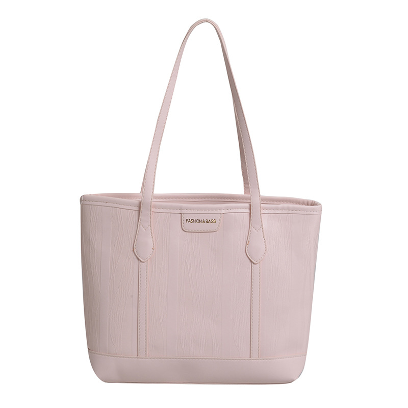 The new 2025 trendy and fashionable Korean-style tote bag with a simple and large-capacity commuting style and a unique and stylish single-shoulder bag are selling well Item Picture