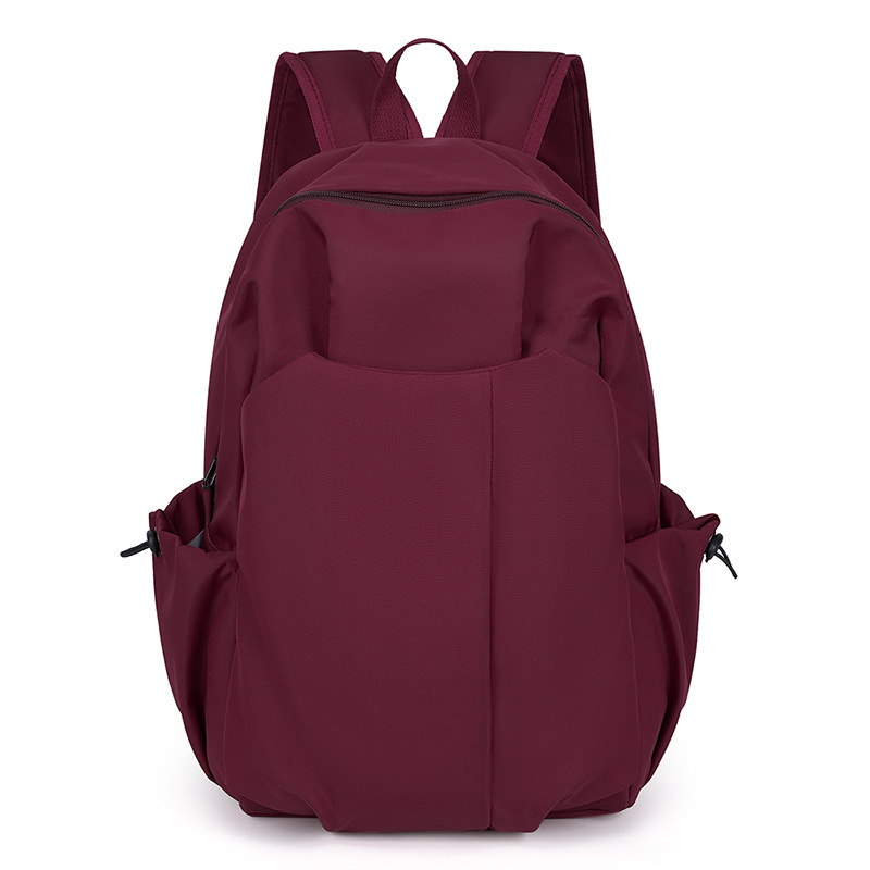 High-end custom large-capacity cross-border wear-resistant bag, solid-color bag for junior high school, senior high school and college students, men's and women's bags, versatile backpacks Item Picture