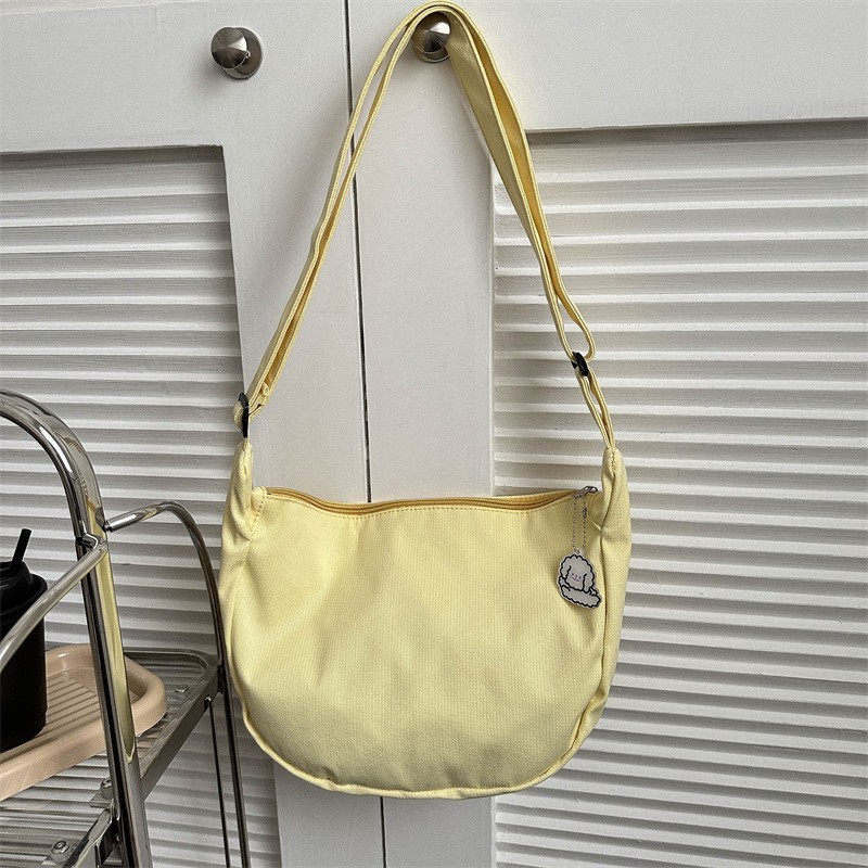 New Japanese-style Harajuku minimalist crossbody bag, Korean-style versatile student waffle check single-shoulder bag, artistic solid-color dumpling bag details Picture