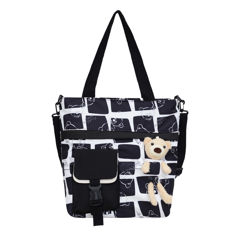 Cute large-capacity tutorial bag for girls, new simple nylon hand-held tutorial bag for junior high school and primary school students, crossbody bag wholesale Item Picture