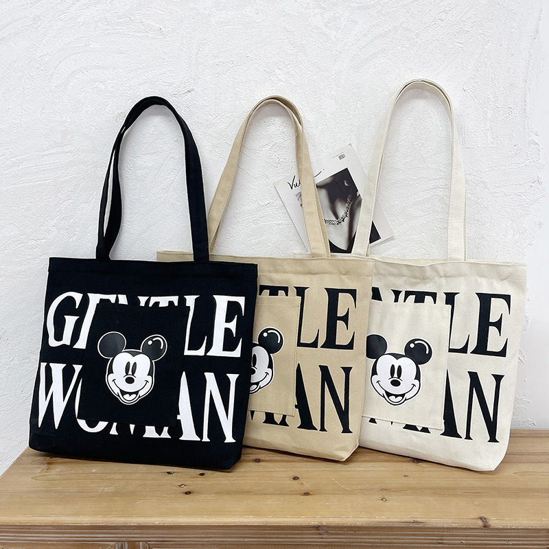 Large-capacity canvas bag for women, 2024 new trendy cartoon Mickey Mouse tote bag, single-shoulder tote bag for college students' classes full figure