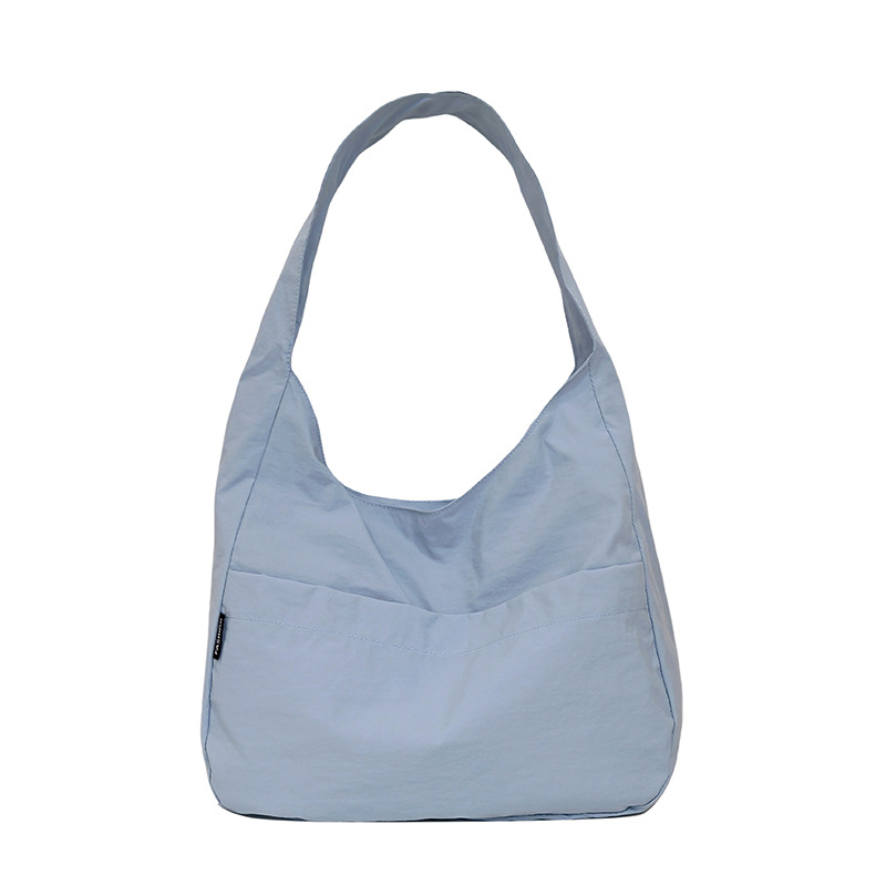 Casual single-shoulder nylon fabric bags are bestsellers for women. Simple and lightweight tote bags are versatile for students. Hand-held commuter bags are selling well Item Picture