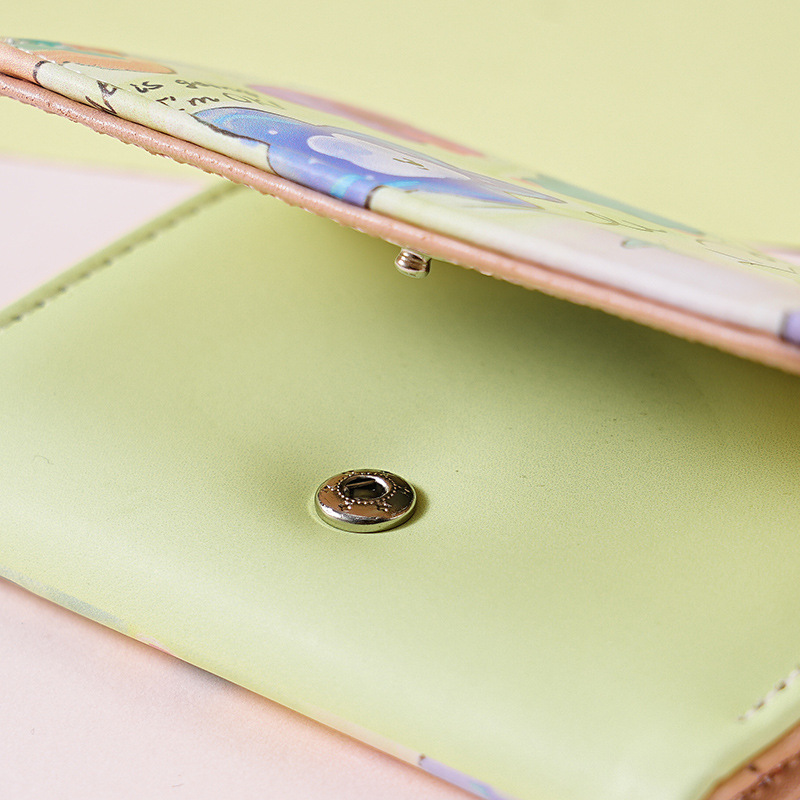 This is a new minimalist, colorful graffiti short, cute and niche design for women. It features a foldable, compact and multi-slot three-fold wallet Application Scenario