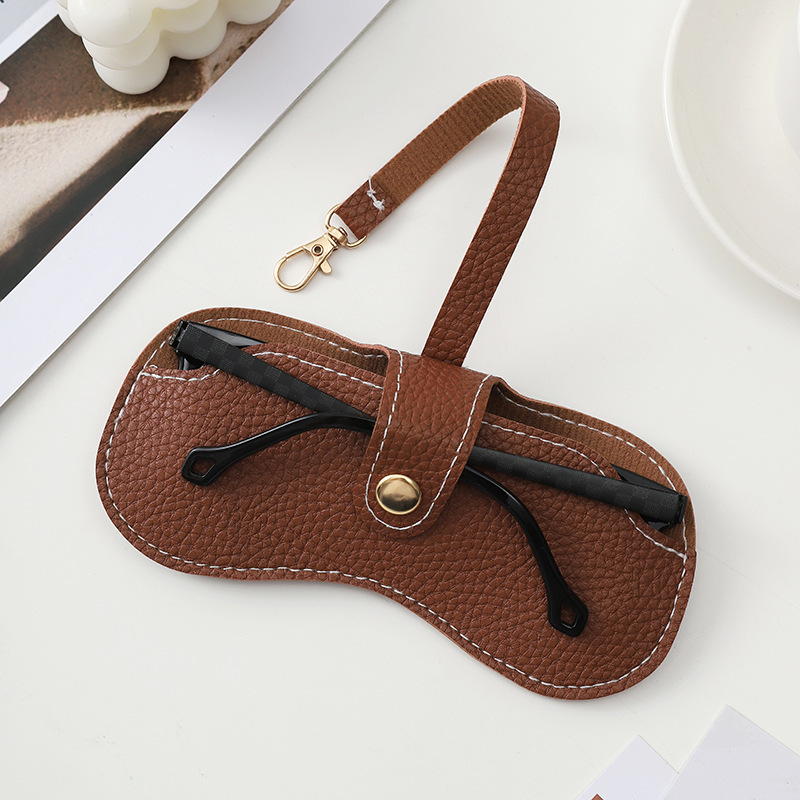 New best-selling wholesale vintage sunglasses bag, portable buckle glasses case, fashionable and simple glasses storage bag details Picture