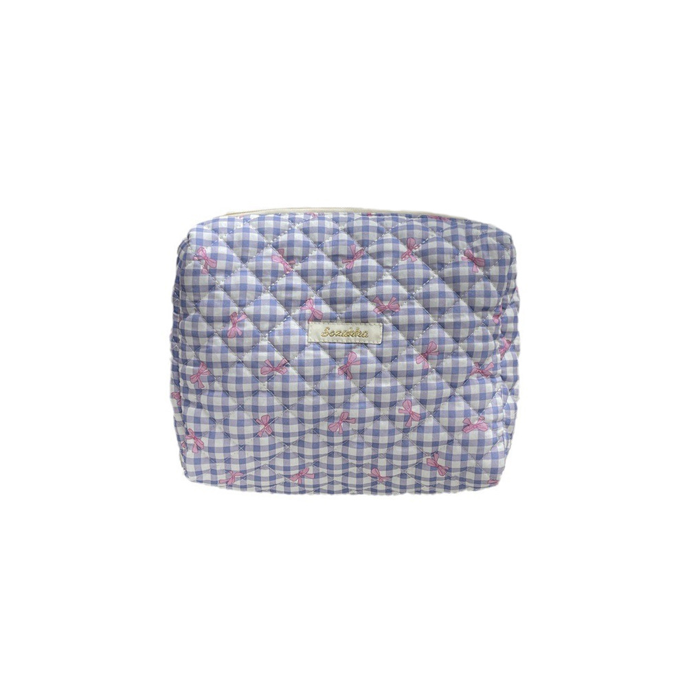 46131 Fresh and light quilted bow hand-held makeup bag, large-capacity portable travel storage toiletry bag for girls Item Picture
