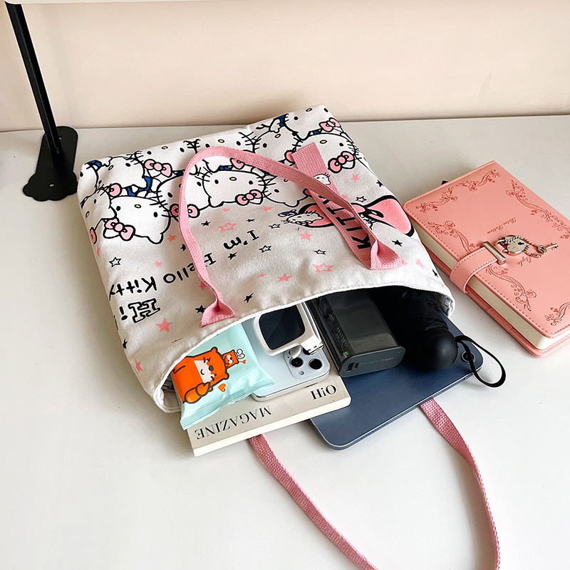 The new fashionable cartoon canvas bag, simple and versatile tote bag, cute commuting single-shoulder tote large bag, is selling well across borders Application Scenario
