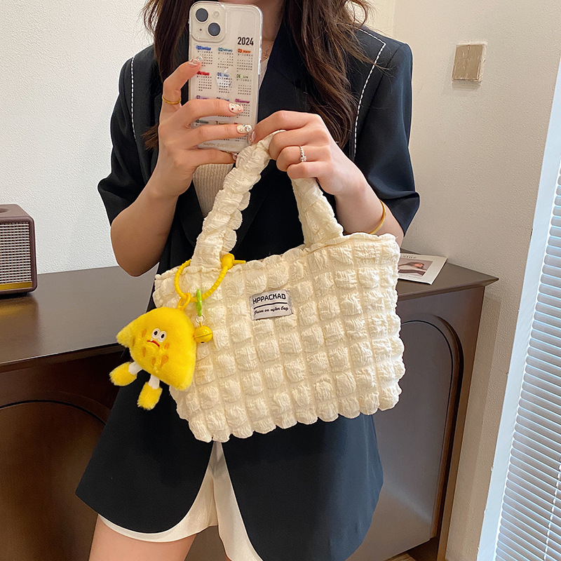 New cloud bubble pleated commuter single-shoulder hand-held bun mother bag, simple and large-capacity summer Korean version ins women's bag details Picture