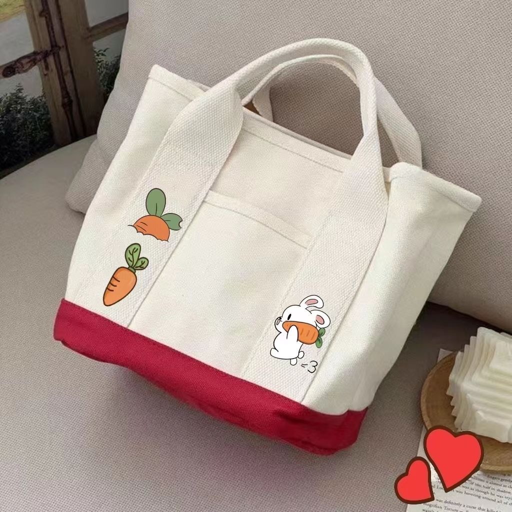 New canvas bag, summer little rabbit carrot handbag, cute hand-held bag, multi-pocket bag for moms going out Application Scenario