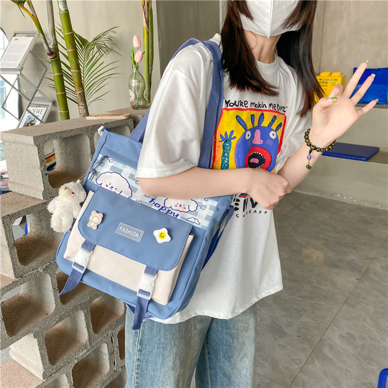 Crossbody bag, school work bag, female Instagram Japanese-style postman bag, large-capacity versatile canvas single-shoulder bag, student hand-carry Application Scenario
