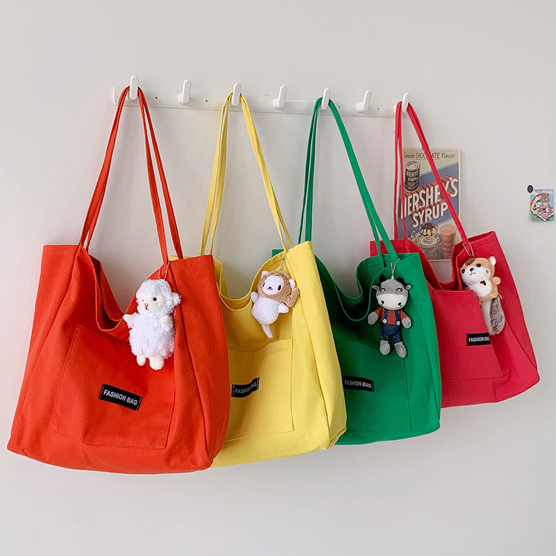 Candy-colored canvas bag, 2021 new ins bag, large-capacity tote bag, simple Korean-style single-shoulder artistic handbag full figure
