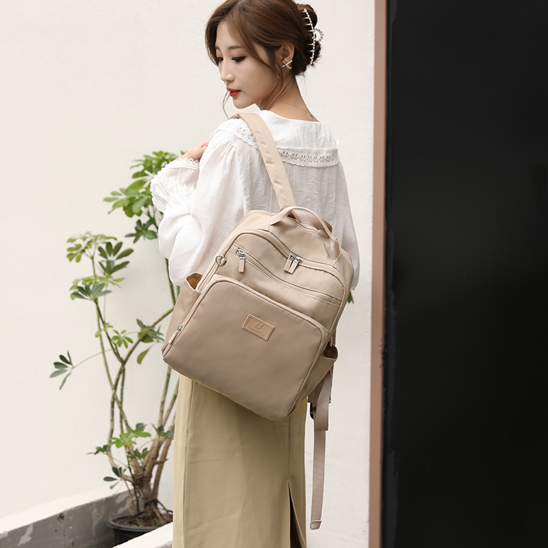 Backpack for women's outdoor high-capacity travel, Korean style trendy water-resistant handbag, simple nylon schoolbag Specification drawing