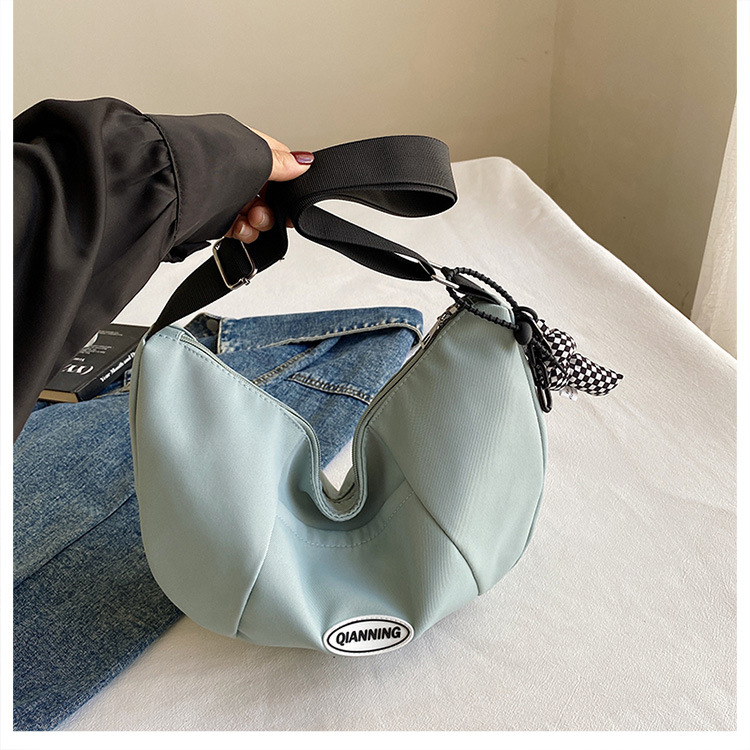 ins minimalist style nylon canvas large bag for women, large capacity, campus college students, crossbody single-shoulder versatile dumpling bag details Picture