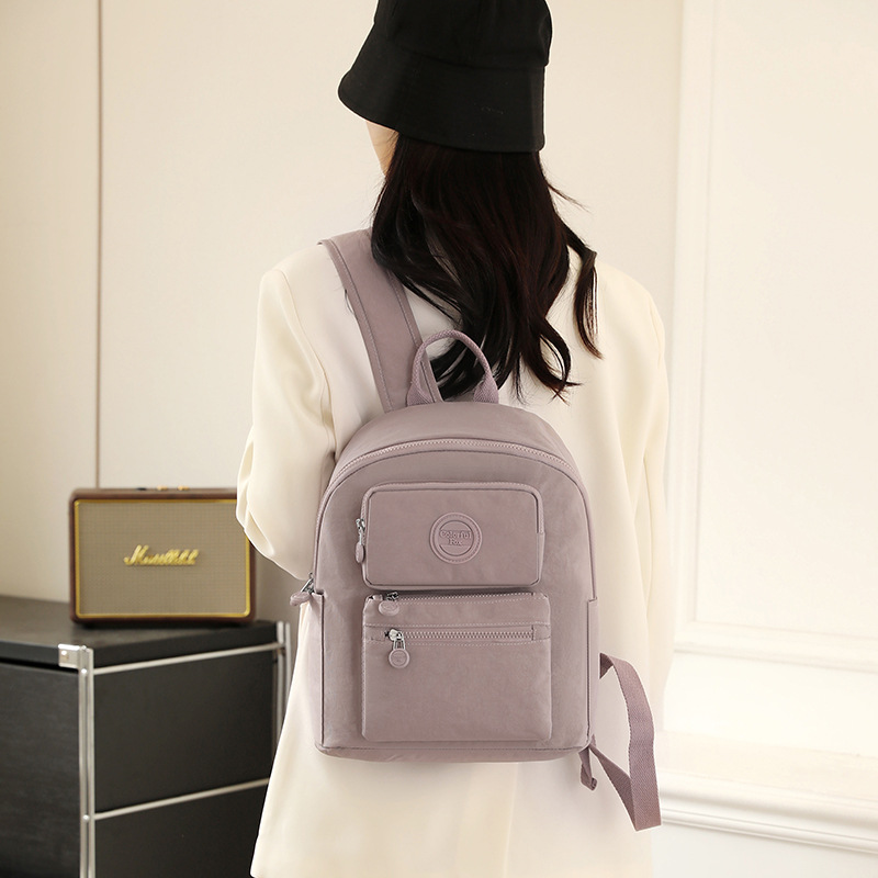 Colorful Fox's new cross-border backpack for women is a fashionable, simple and versatile casual bag made of nylon fabric with a large capacity details Picture