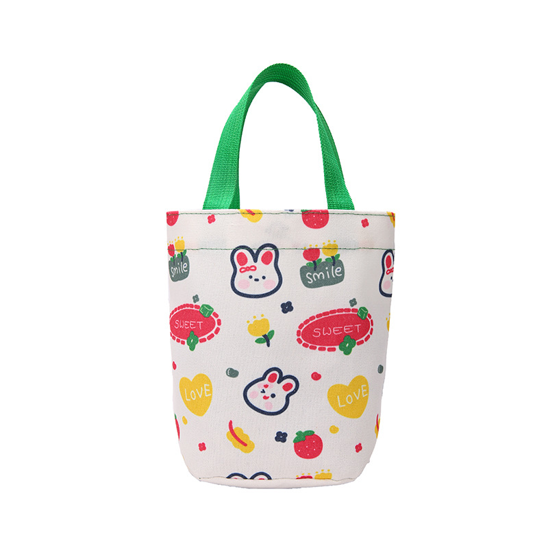 The 2023 new Japanese-style bucket-shaped hand-held canvas bag is simple, versatile and artistic. It features a small capacity bento box for both men and women Item Picture