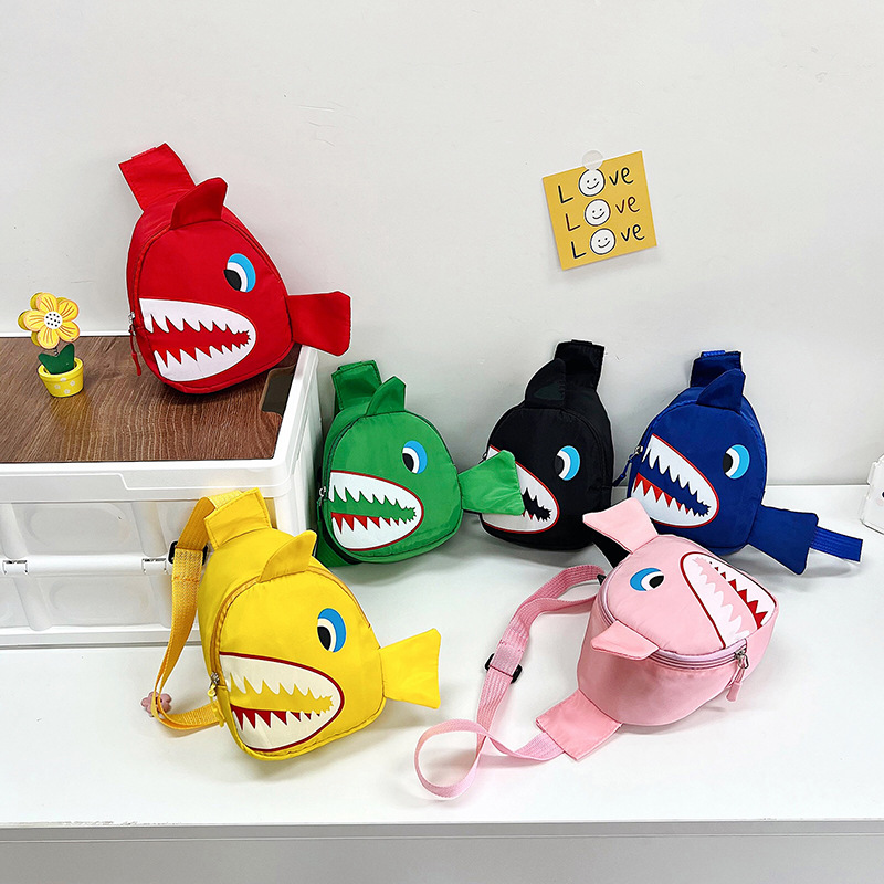 This trendy children's bag is a unique little shark chest bag for boys. It's a stylish crossbody bag for babies going on trips full figure
