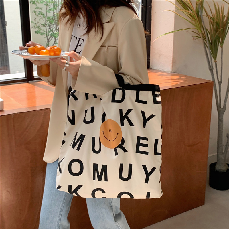 19152 Smiling face letter canvas bag, Korean-style ins girl single-shoulder bag, handbag, large capacity shopping bag, tote bag full figure