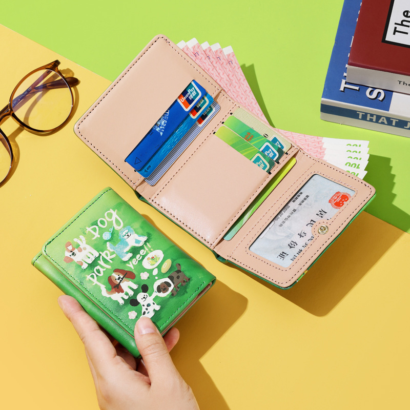 The "Spring Outing Puppy Wallet" features a compact card holder with a large capacity and multiple card slots. It is a new 2024 women's coin purse with a short wallet and is a niche men's coin purse details Picture
